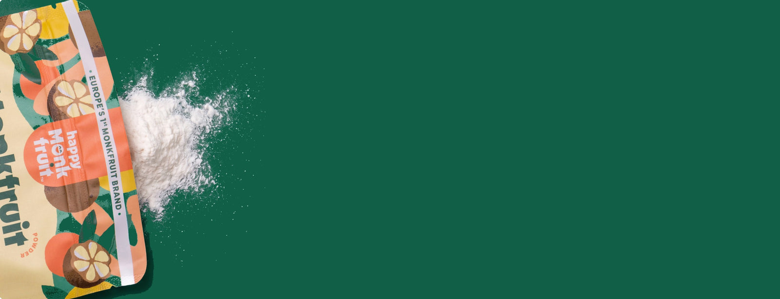 Happy Monkfruit powder pouch on a deep green background